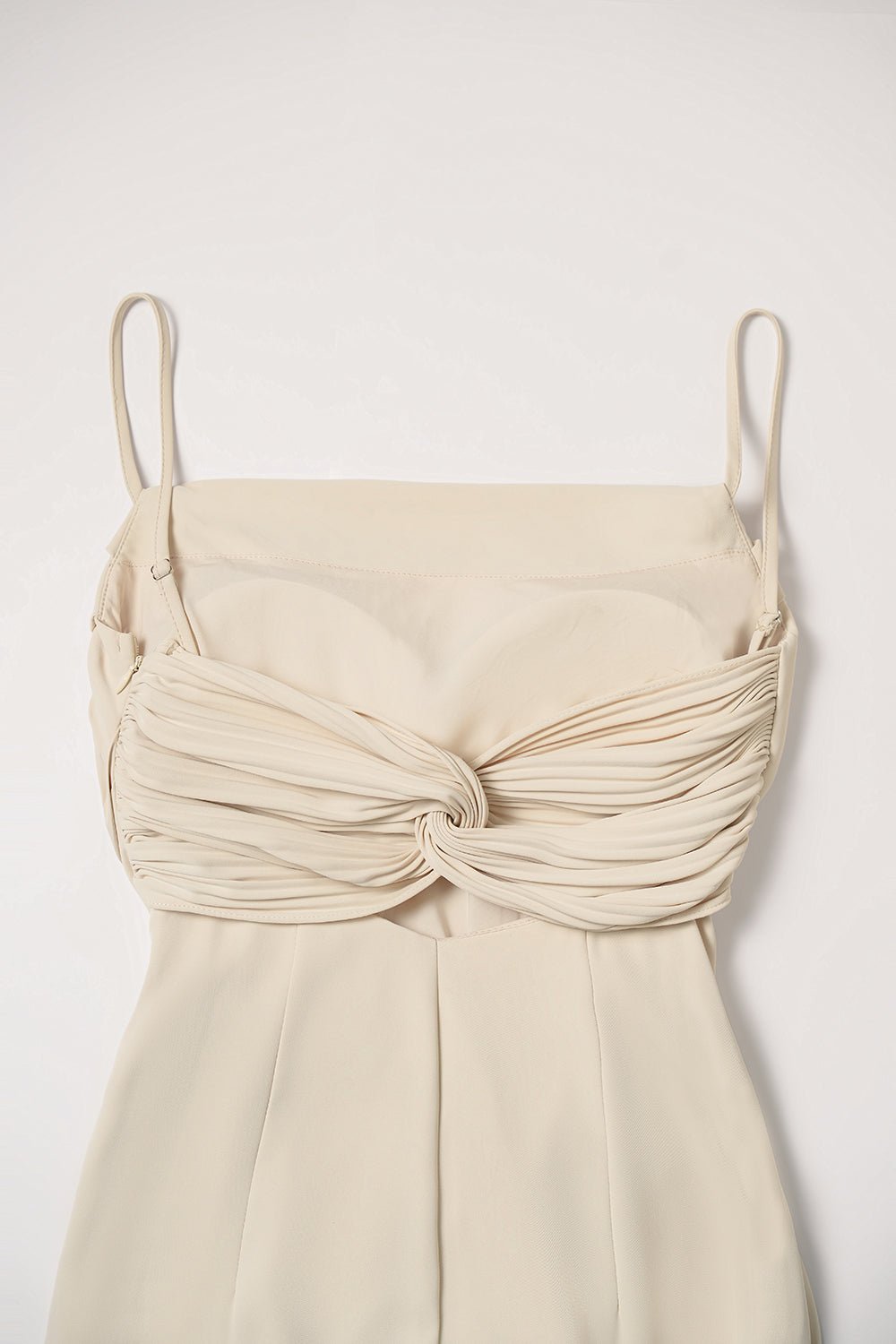 Keren Pleated Twist Back Padded Dress in Cream