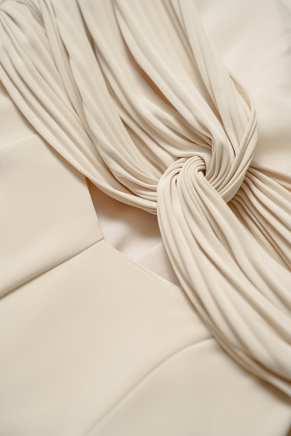 Keren Pleated Twist Back Padded Dress in Cream