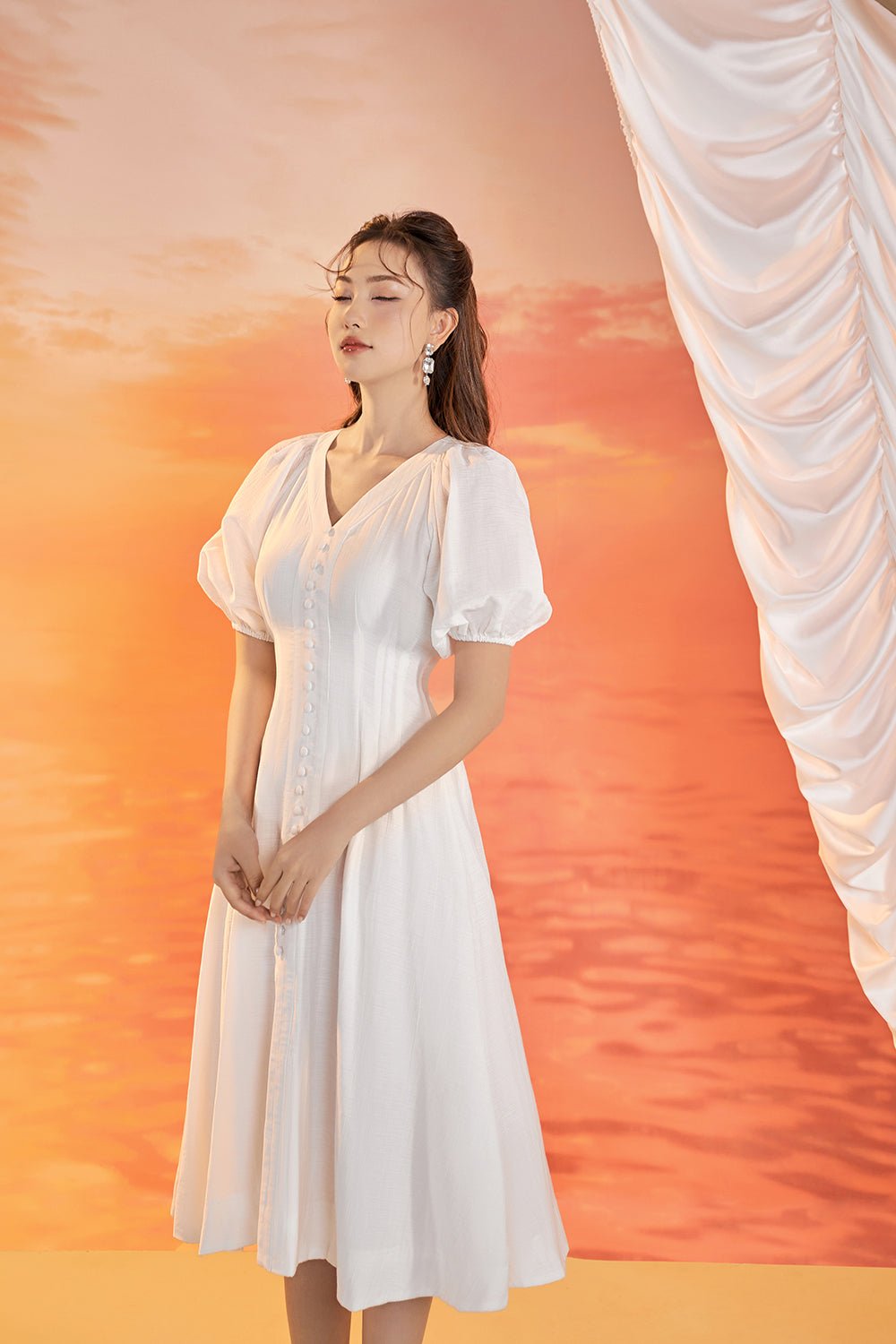 Nori Puffy Sleeved Fit & Flare Dress in Iconic White