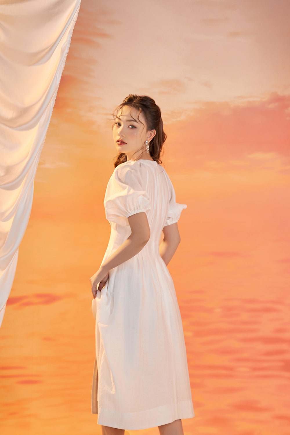 Nori Puffy Sleeved Fit & Flare Dress in Iconic White